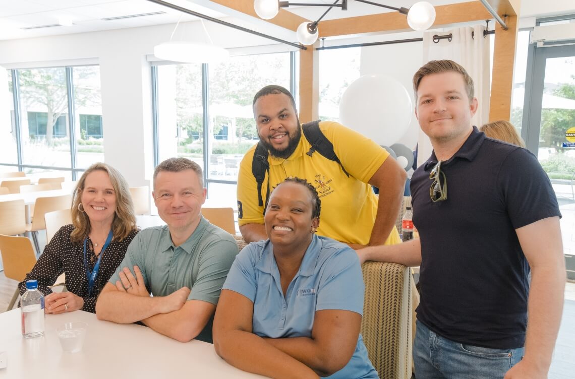 TST team at the ribbon cutting Event