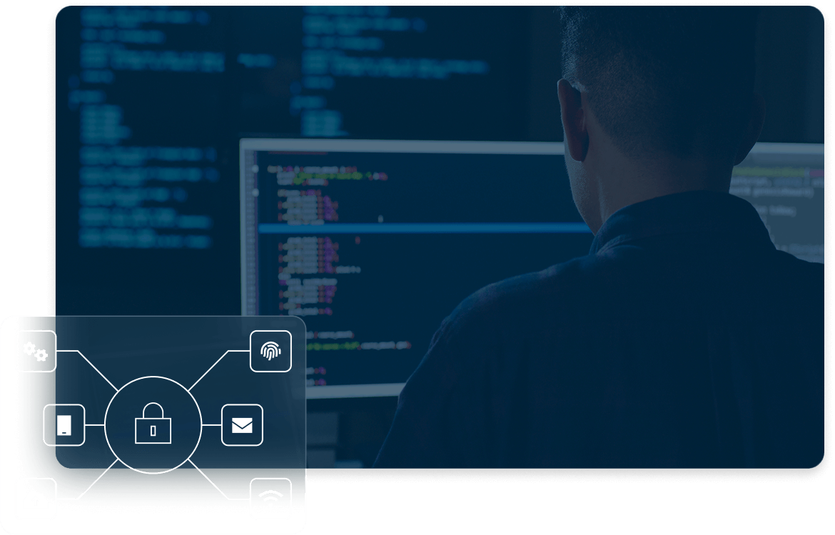 A person monitors code on a computer screen with a security icon overlay emphasizing data protection and cybersecurity.